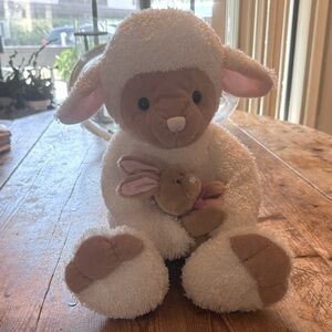 Gund lamb holding a bunny rabbit
